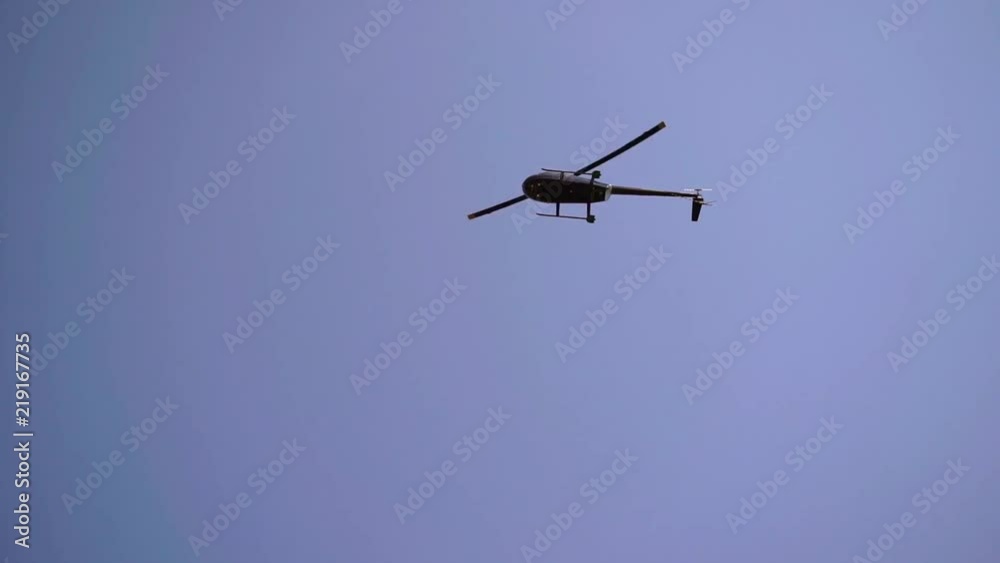 Helicopter flying in a sky slowmotion Helicopter flying in a sky slowmotion