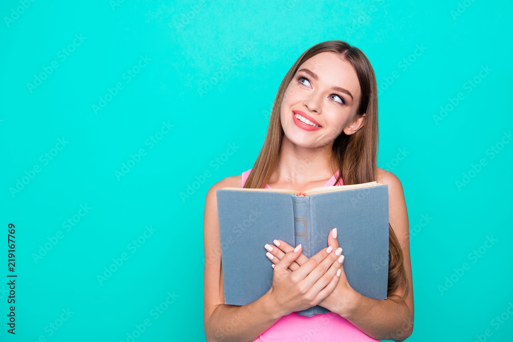 Portrait of attractive young smiling girl wearing pink blouse ho Portrait of attractive young smiling girl wearing pink blouse ho