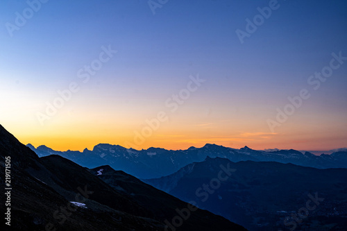 Scenic view of beautiful Swiss Alps mountains. Blue hour sunset with pink and blue tones  Verbier  Canton du Valais  Wallis  Switzerland.