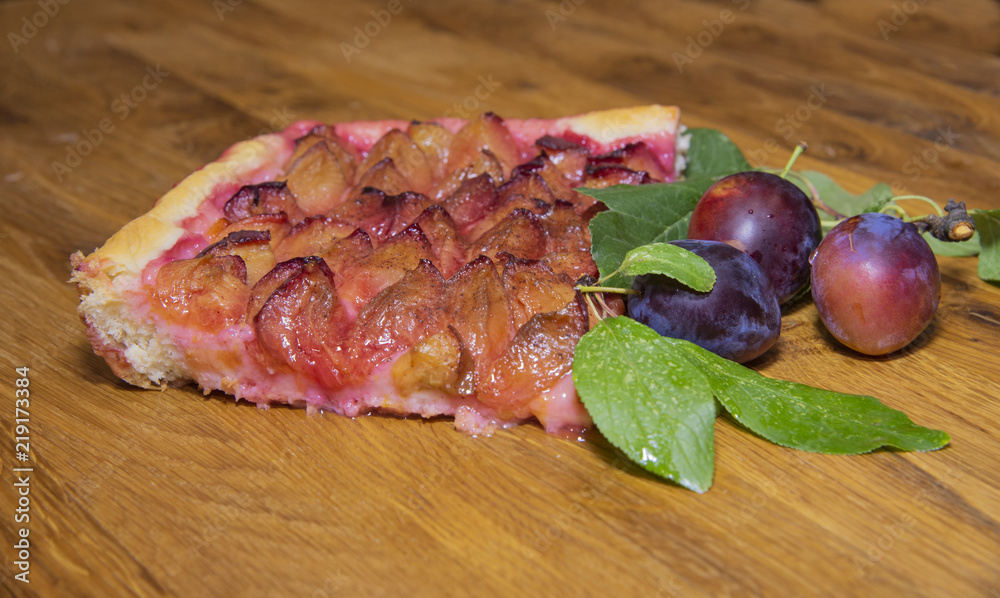 A piece of traditional German pie made from fresh plums.