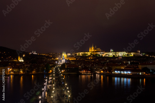 Night scenery of top view over Charles Bridge  old iconic historical across Vltava river from Old Town Bridge Tower in Prague   Czech Republic