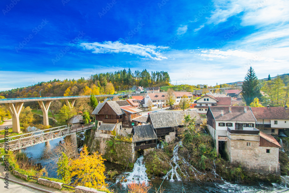 Rastoke, Slunj, Croatia, bridge over Korana river canyon and beautiful traditional village with old water mills on waterfalls, beautiful countryside landscape 