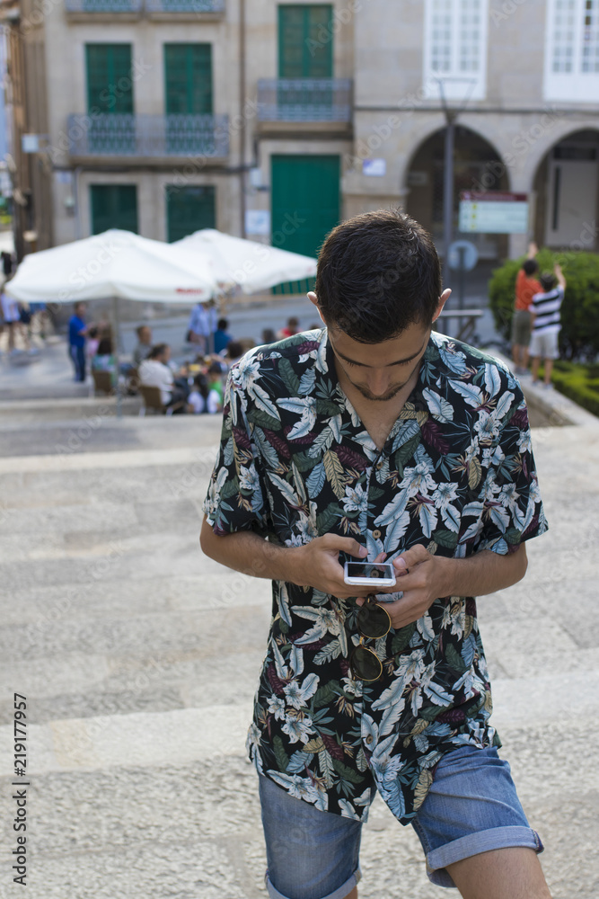 young fashion with mobile phone in the open air city young fashion with mobile phone in the open air city