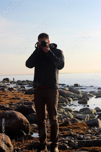 Photographer at the beach, estonia