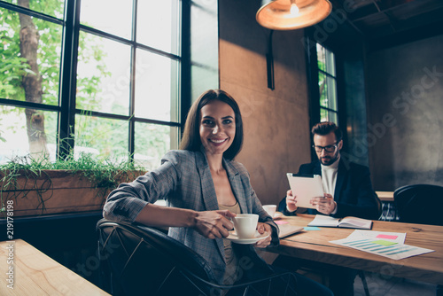 Two modern stylish elegant classic business people, partners wea photo