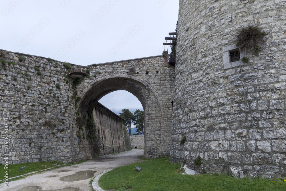 Part of a tower and a gate conneting to the wall of Brescia castle