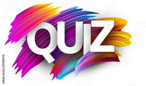 Quiz sign with colorful brush strokes.