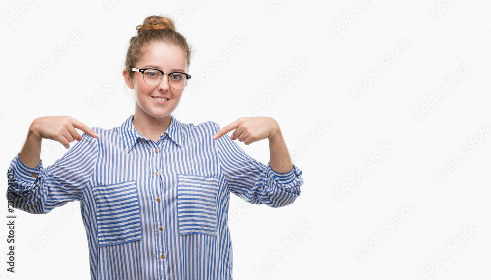 Young blonde business woman looking confident with smile on face, pointing oneself with fingers proud and happy. Young blonde business woman looking confident with smile on face, pointing oneself with fingers proud and happy.