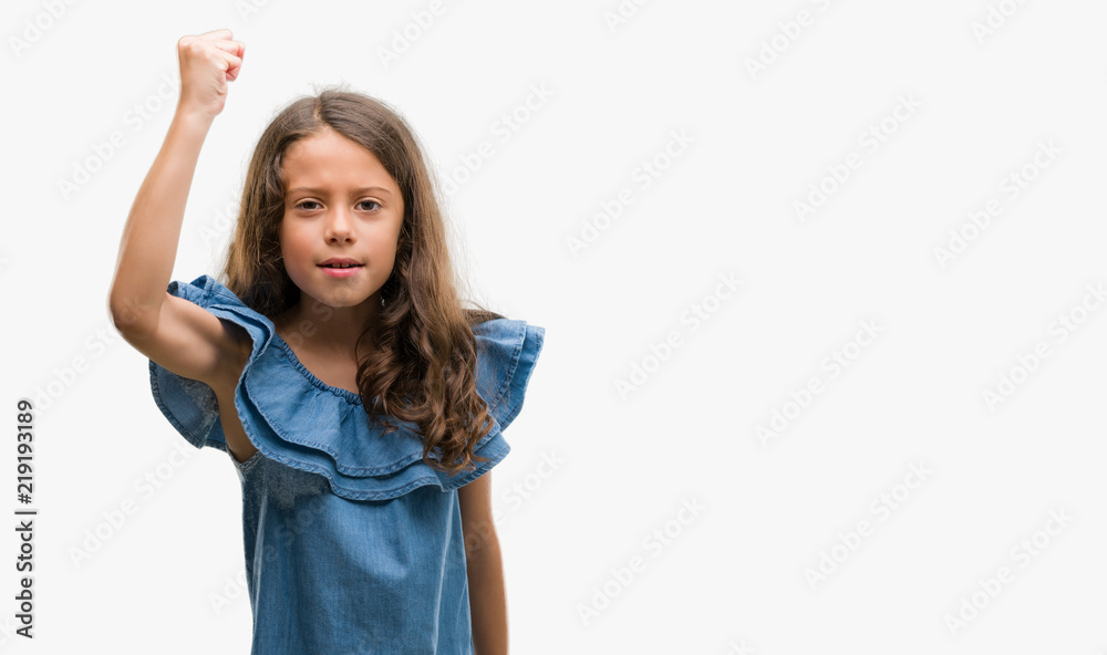 Brunette hispanic girl wearing denim dress annoyed and frustrated shouting with anger, crazy and yelling with raised hand, anger concept Brunette hispanic girl wearing denim dress annoyed and frustrated shouting with anger, crazy and yelling with raised hand, anger concept