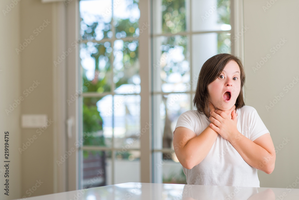 Down syndrome woman at home shouting and suffocate because painful strangle. Health problem. Asphyxiate and suicide concept. Down syndrome woman at home shouting and suffocate because painful strangle. Health problem. Asphyxiate and suicide concept.