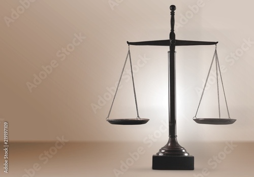 Law scales on table background. Symbol of justice photo