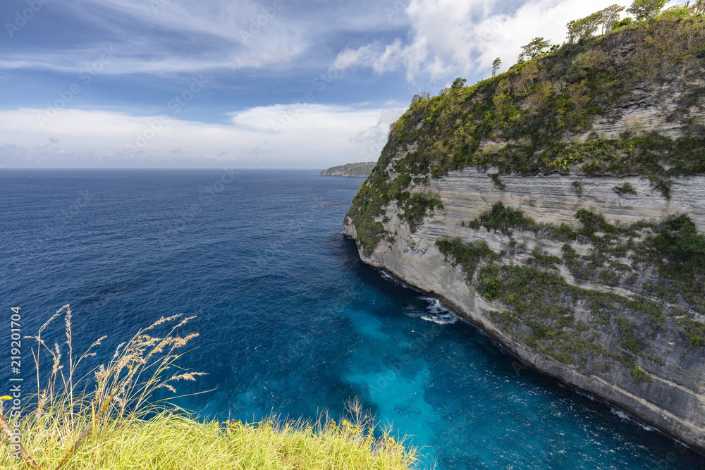Tropical clear water above Belah Poh point on Nusa Penida near Bali.