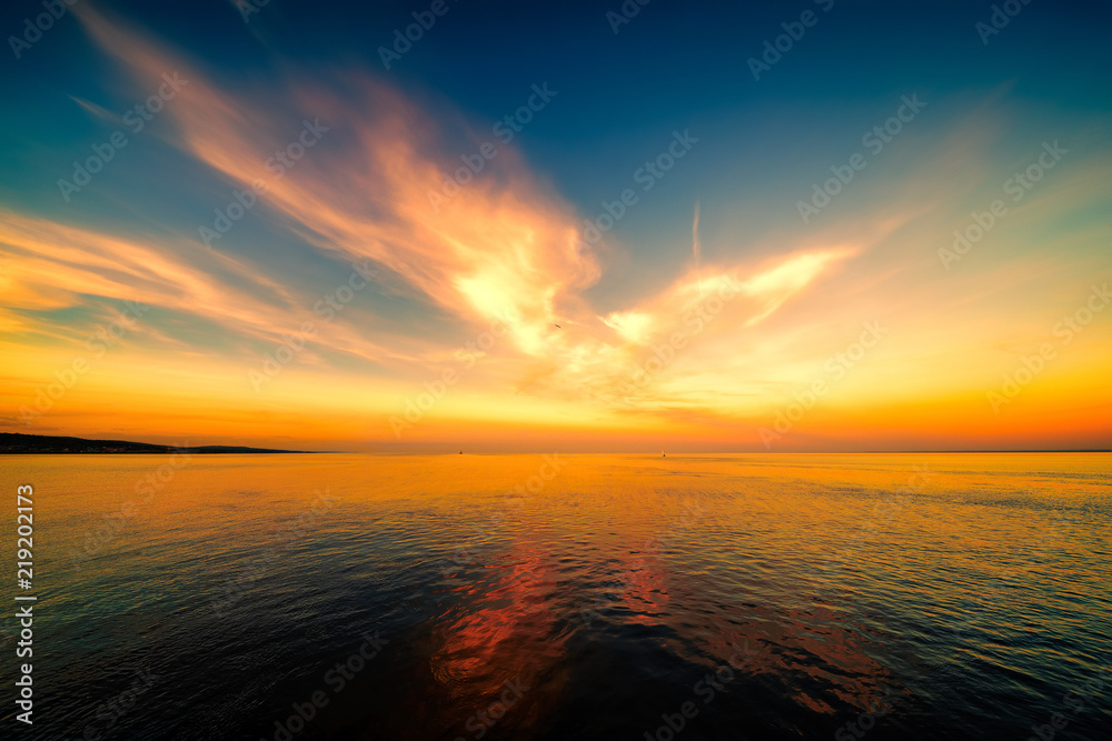 Fantastic sunset and clouds at the horizon of Lake Superior