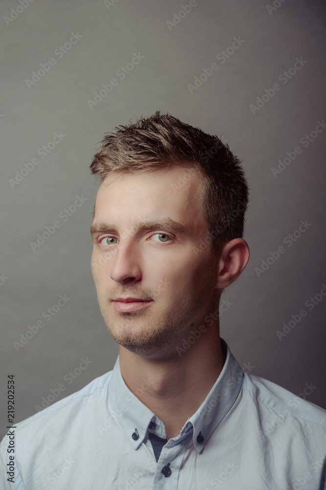 Obraz premium Portrait of a smart serious young man