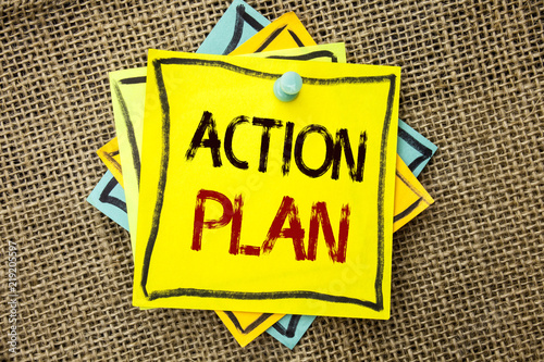 Text sign showing Action Plan. Conceptual photo Strategy Operational Planning Procedure Activity Goal Objective written Sticky Note Paper attached to jute background with Thumbpin it. photo