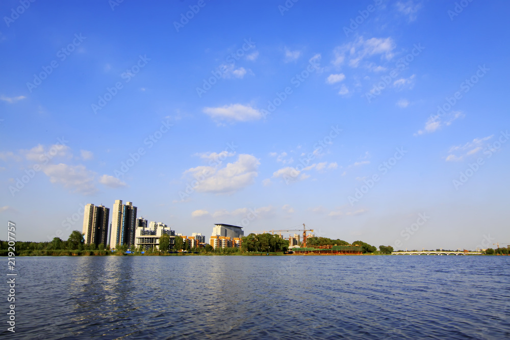 High-rise buildings standing at the water's edge
