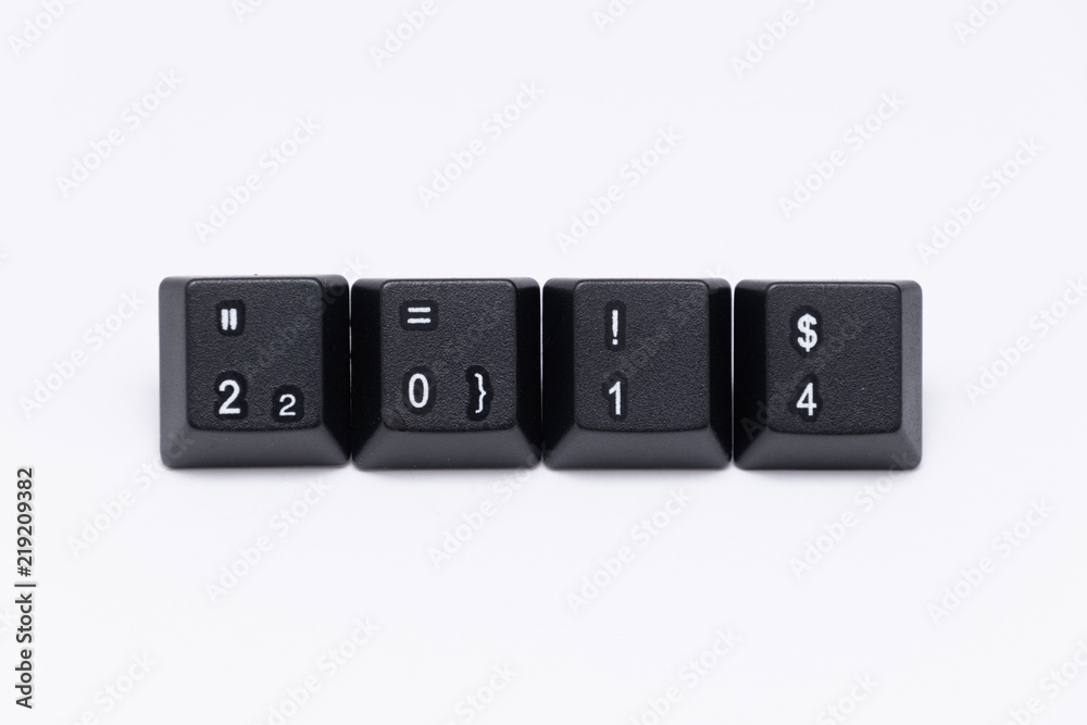 Black keys of keyboard with different years, words, names