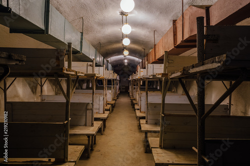Cuadro en lienzo Wooden double-decker beds inside old abandoned soviet bomb shelter