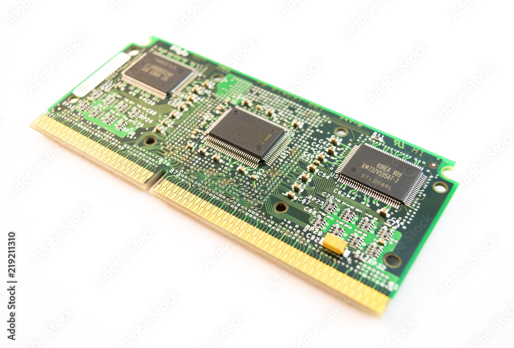 Close-up of a circuit board from an old computer over white background. Close-up of a circuit board from an old computer over white background.