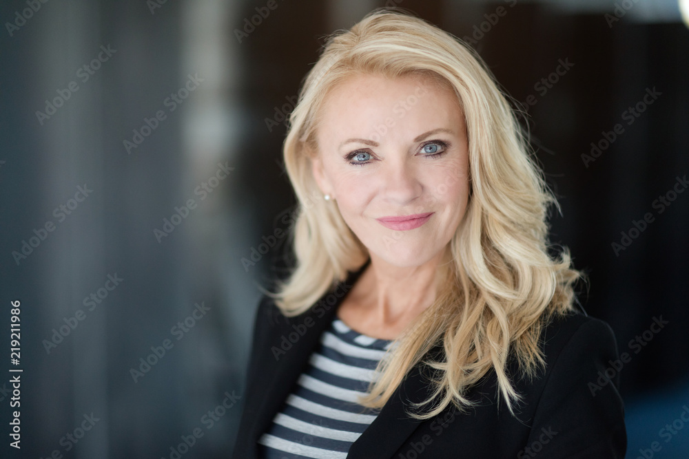 Portrait Of A Mature Businesswoman Smiling