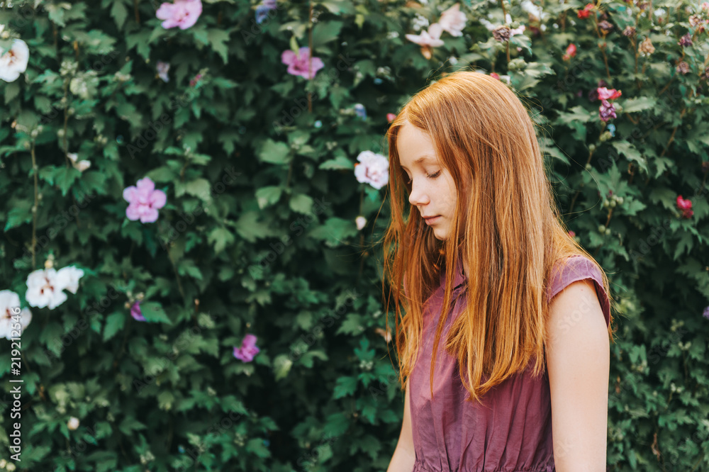 Outdoor portrait of beautiful red-haired girl Outdoor portrait of beautiful red-haired girl