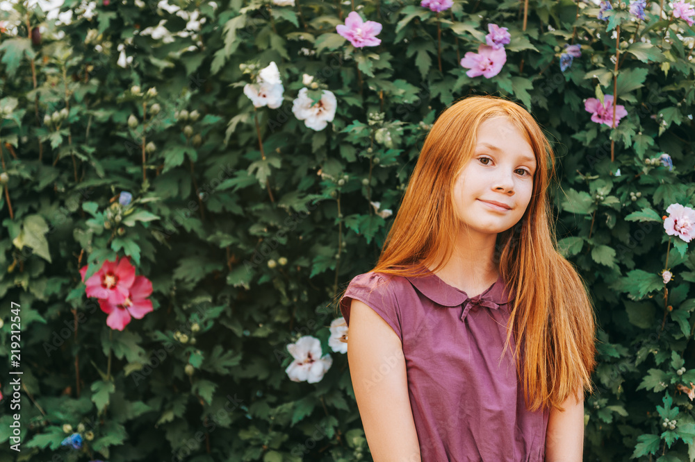 Outdoor portrait of beautiful red-haired girl Outdoor portrait of beautiful red-haired girl