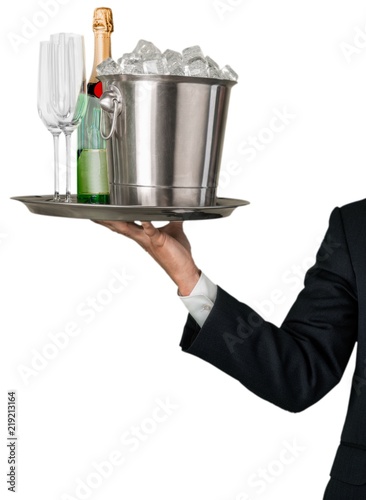 Waiter Hand with Bottle of Champagne and Glasses