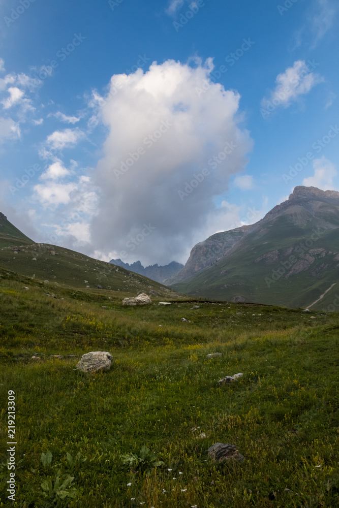 Fototapeta premium the little cloud into the alpine valley