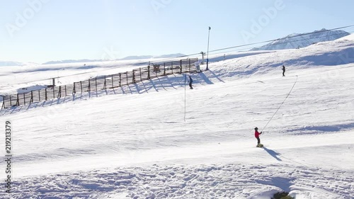 People skiing and having fun at the mountain