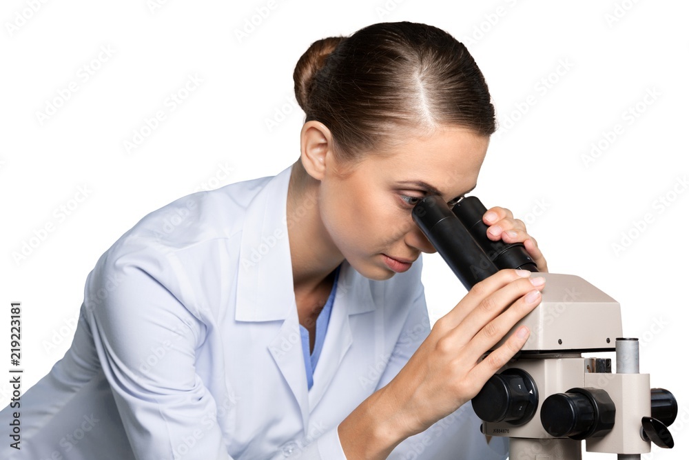 Female Scientist / Researcher / Doctor Using Microscope Female Scientist / Researcher / Doctor Using Microscope