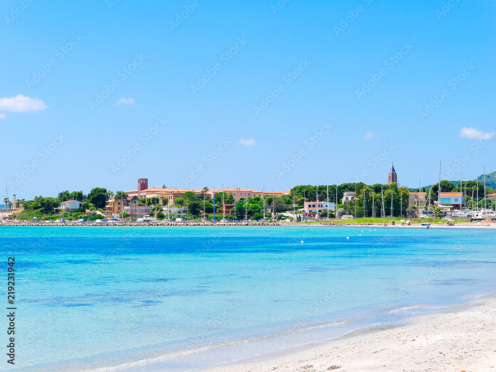 View of the beautiful sea and Fertilia in the background. The municipality of Alghero, Sardinia, Italy.