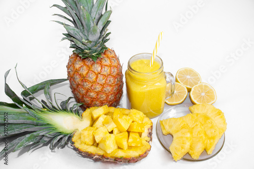 Still life. Pineapple juice, cocktails with fresh pineapple for breakfast in the morning on a white background. Detox. For health and for weight loss.