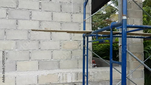 background of construction site, pan shot from right to right. Using gimbal equipment. 