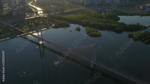 Aerial view of footbridge over the Yenisei river Krasnoyarsk city drone footage photo