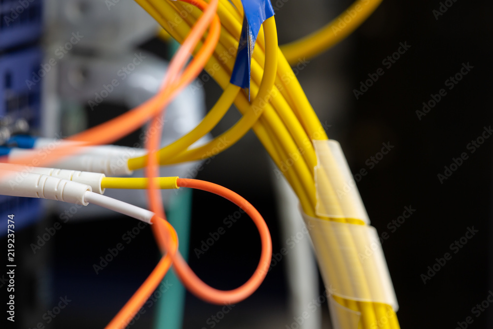 Colored electrical cables and wires Abstract blurred image for use as a background Colored electrical cables and wires Abstract blurred image for use as a background