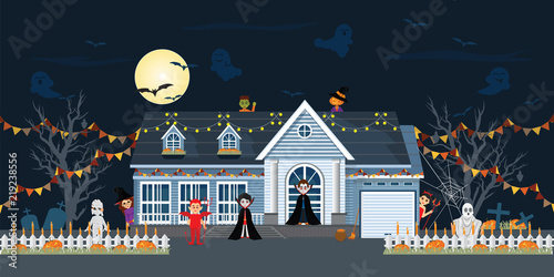 House facade decorated for Halloween night.