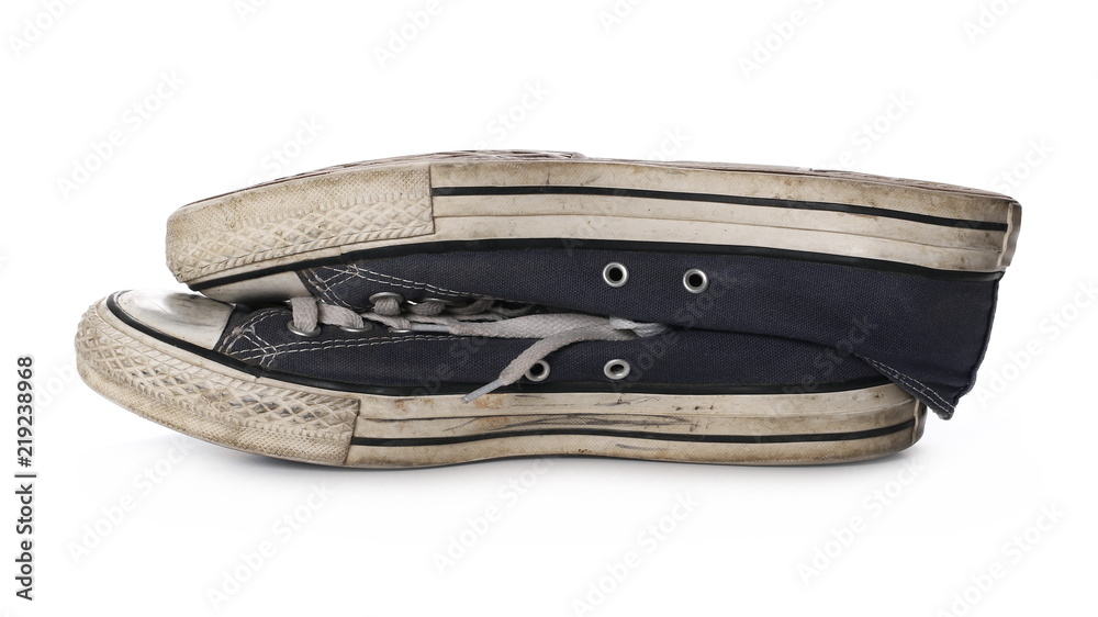 Old blue shoes, sneakers isolated on white background Old blue shoes, sneakers isolated on white background