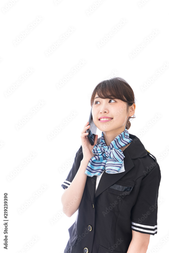 電話をするキャビンアテンダント