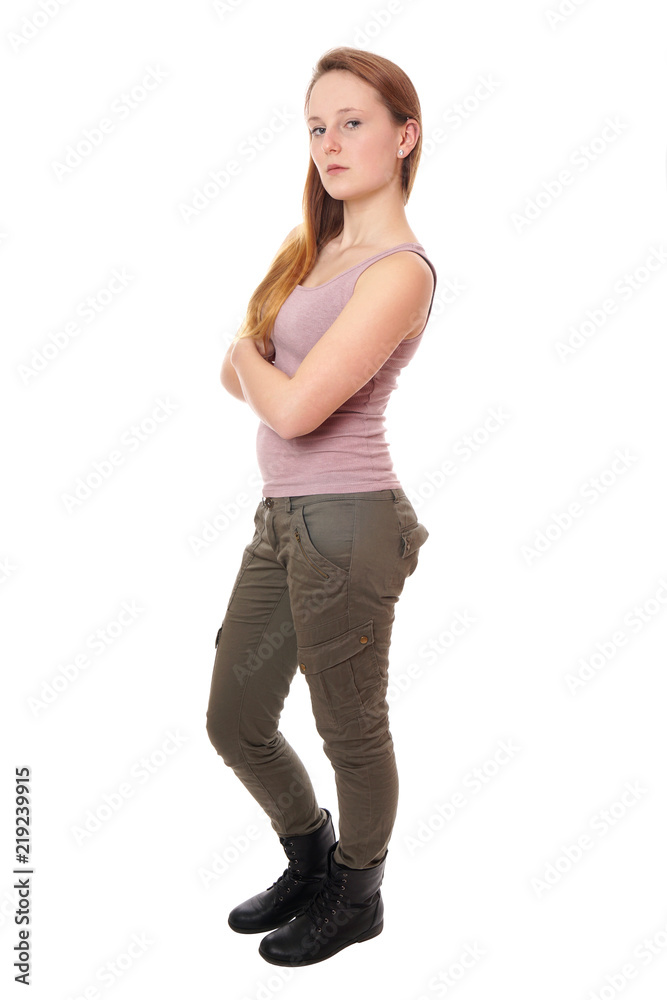 young woman wearing tank top, military style khaki pants and boots young woman wearing tank top, military style khaki pants and boots