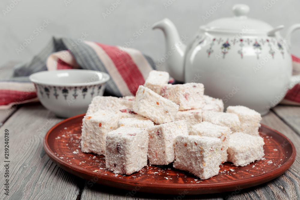Turkish delight on a wooden table.