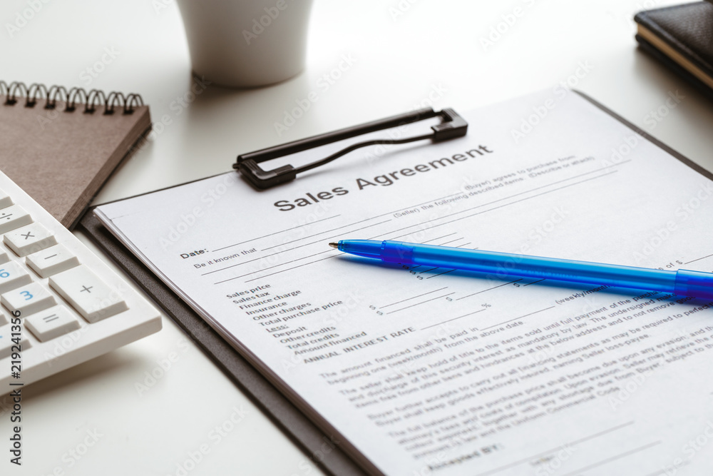 contract form, selling and buying home or condo concept contract form, selling and buying home or condo concept