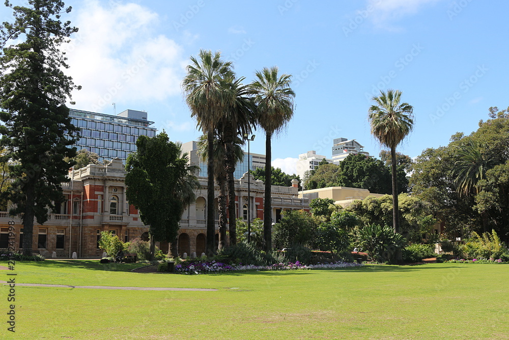 Fototapeta premium Supreme Court Gardens with building of the Supreme Court of Western Australia in Perth