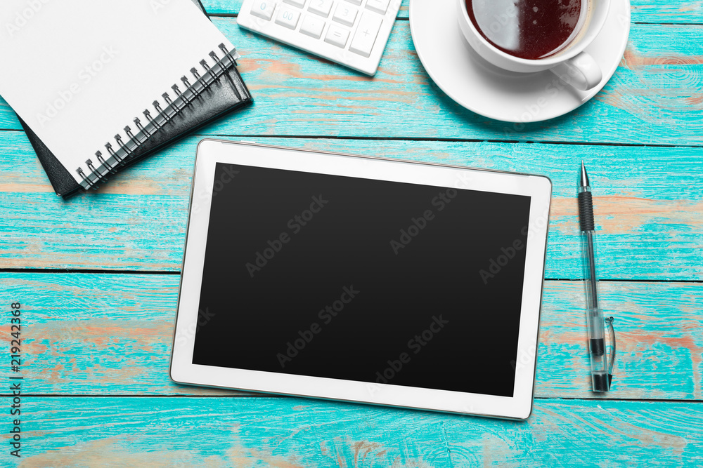 digital tablet and coffee cup on wooden table digital tablet and coffee cup on wooden table