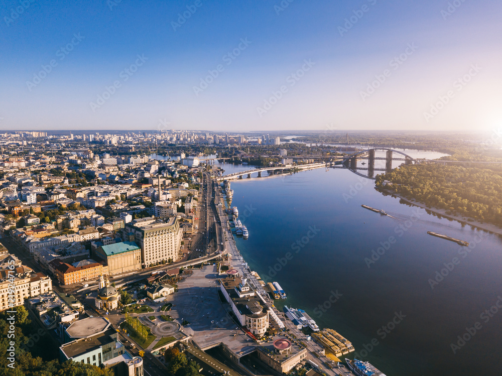 KIev Kyiv Ukrain. River Dnipro (Dnepr). Aerial drone photo from above. Beautiful sunrise. Pochtova plosha Obolon Podil