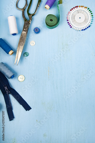 Wallpaper Mural Sewing accessories on a blue  background Torontodigital.ca