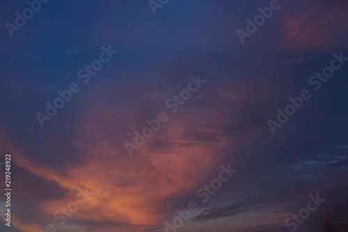 View on beautiful pink clouds in a pink blue sky.