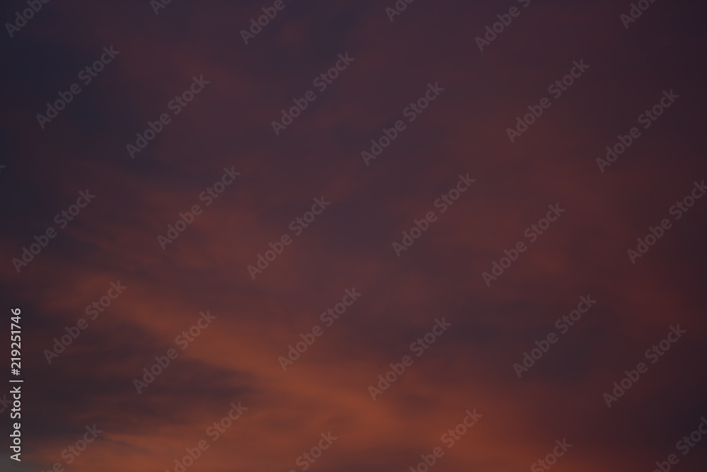 View on beautiful pink clouds in a pink blue sky.