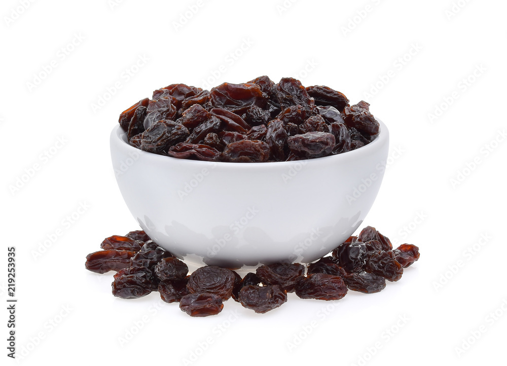 Dried raisins in bowl isolated on white background Dried raisins in bowl isolated on white background