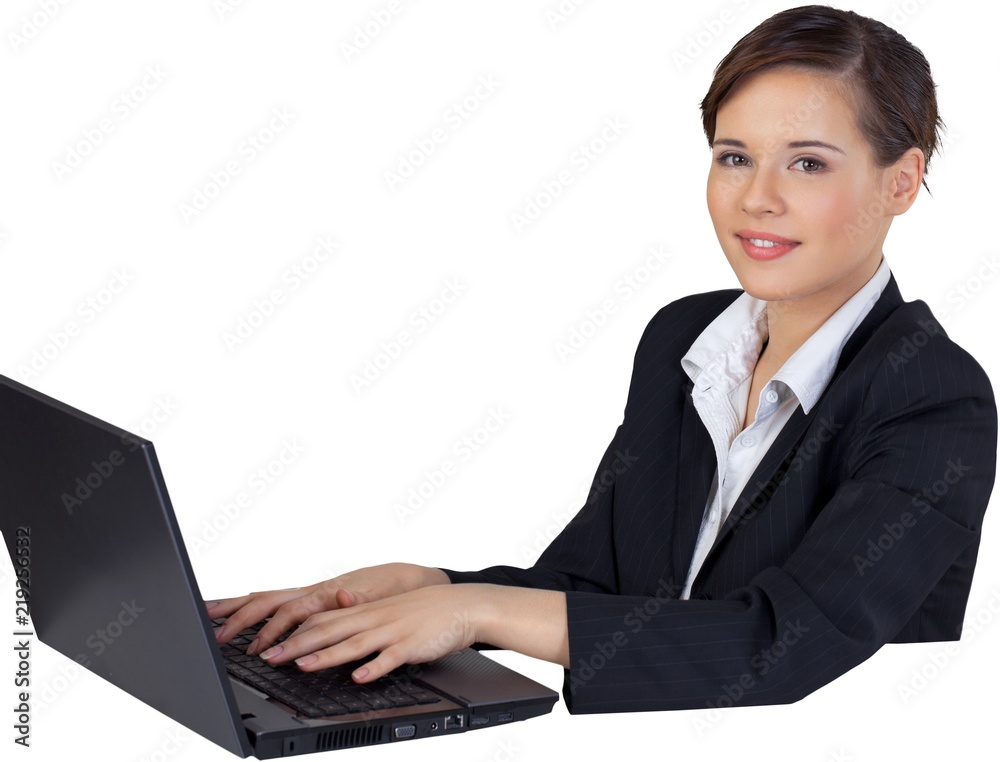 Businesswoman Working on a Laptop - Isolated Businesswoman Working on a Laptop - Isolated
