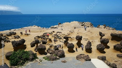 Tourist at the Yehliu Geopark in Wanli District, New Taipei, Taiwan photo